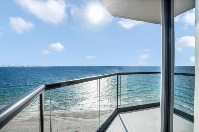 a view of a room with a ceiling fan