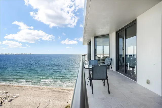 a view of a patio with swimming pool