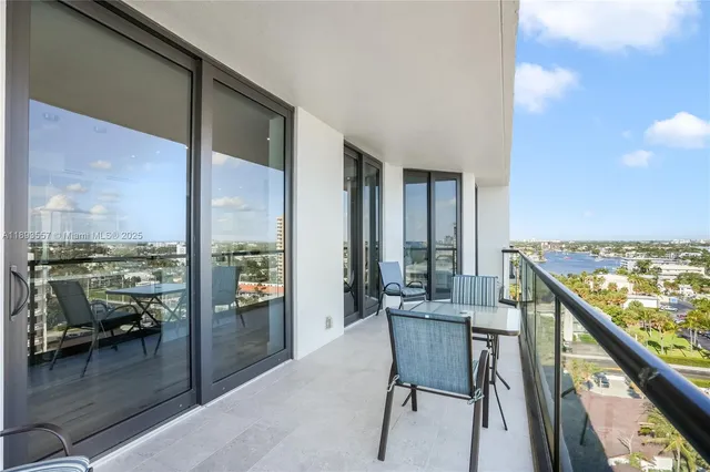 a view of a swimming pool with a lounge chair
