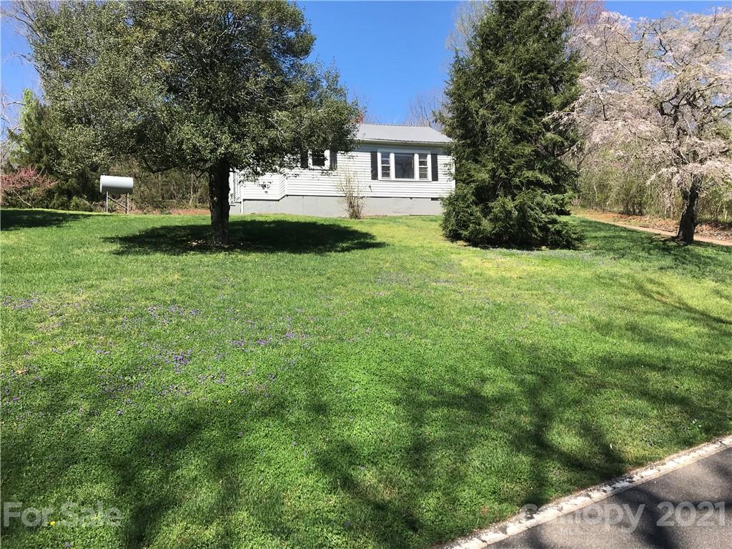 332 Crawley Drive Morganton, NC 28655 - Photo 2 of 15 a view of a house with a backyard
