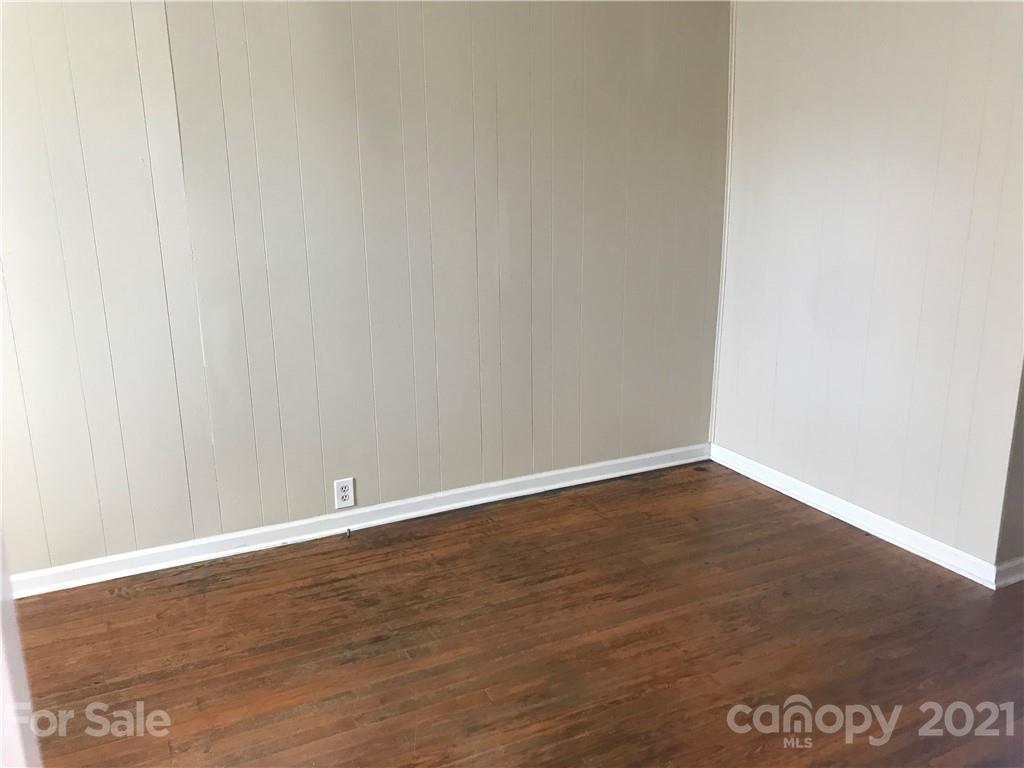 332 Crawley Drive Morganton, NC 28655 - Photo 9 of 15 a view of an empty room with wooden floor