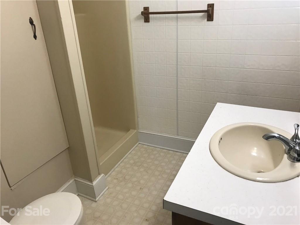 332 Crawley Drive Morganton, NC 28655 - Photo 10 of 15 a bathroom with a toilet and a sink