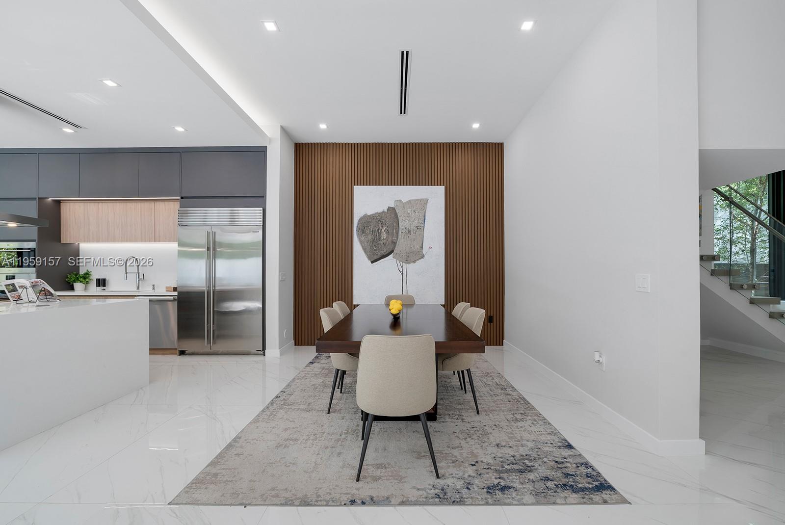 1780 Chucunantah Road Miami, FL 33133 - Photo 11 of 34 a living room with furniture and a rug