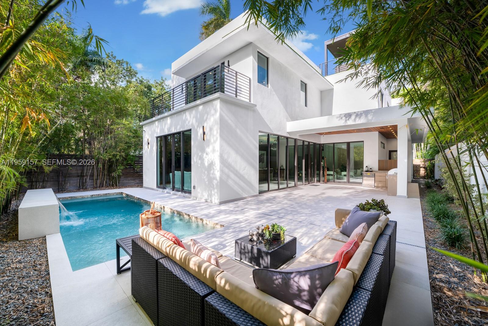 1780 Chucunantah Road Miami, FL 33133 - Photo 19 of 34 front view of house with a patio