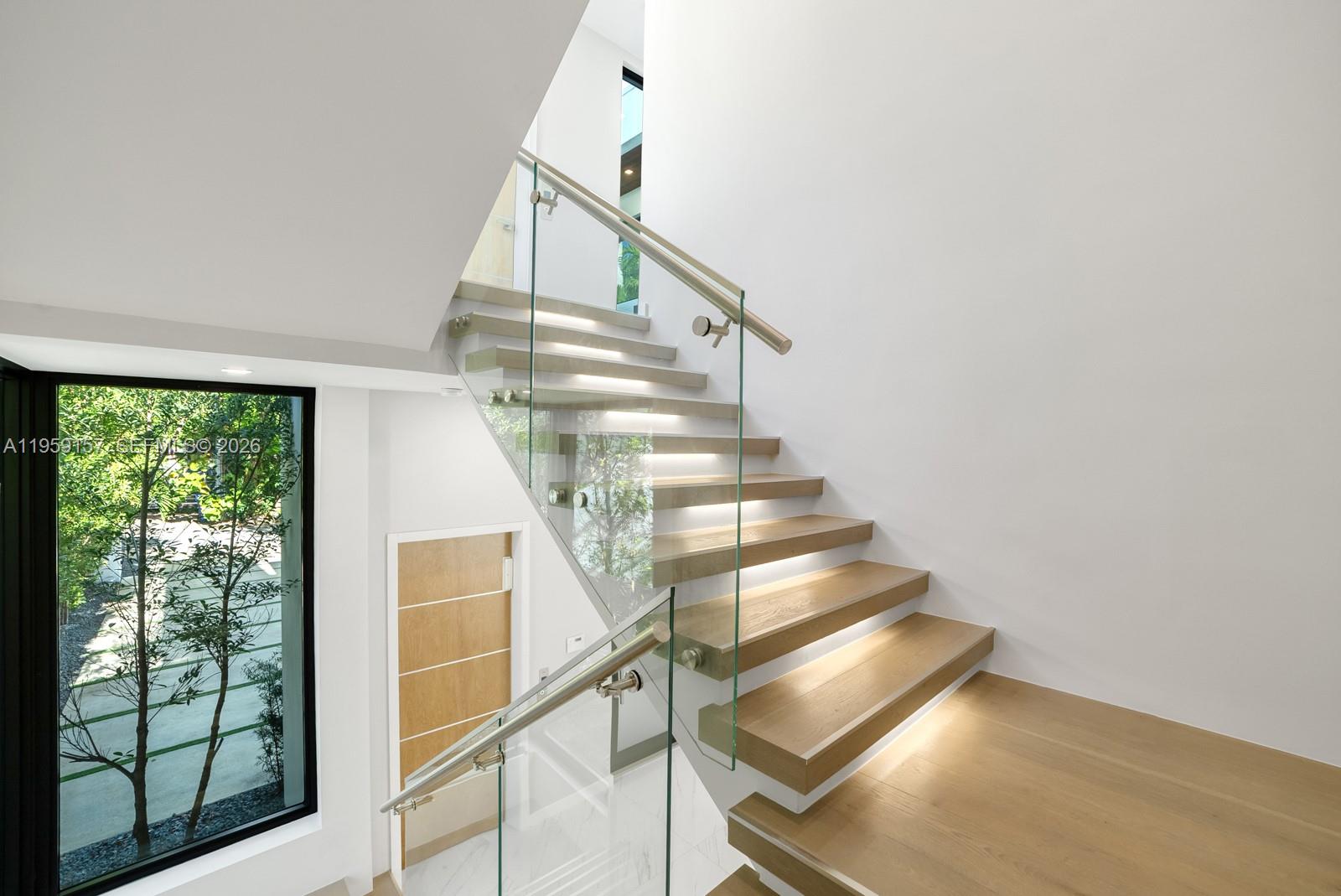 1780 Chucunantah Road Miami, FL 33133 - Photo 21 of 34 a view of entryway with wooden floor