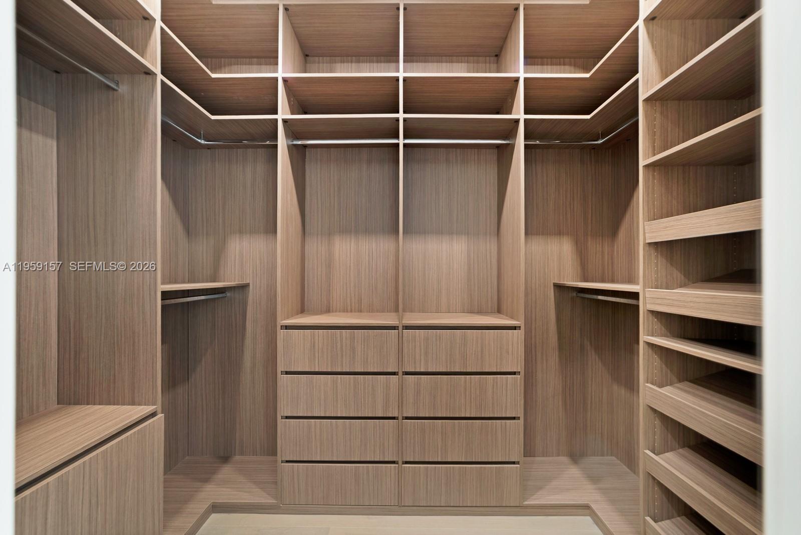 1780 Chucunantah Road Miami, FL 33133 - Photo 28 of 34 a view of walk in closet with empty racks