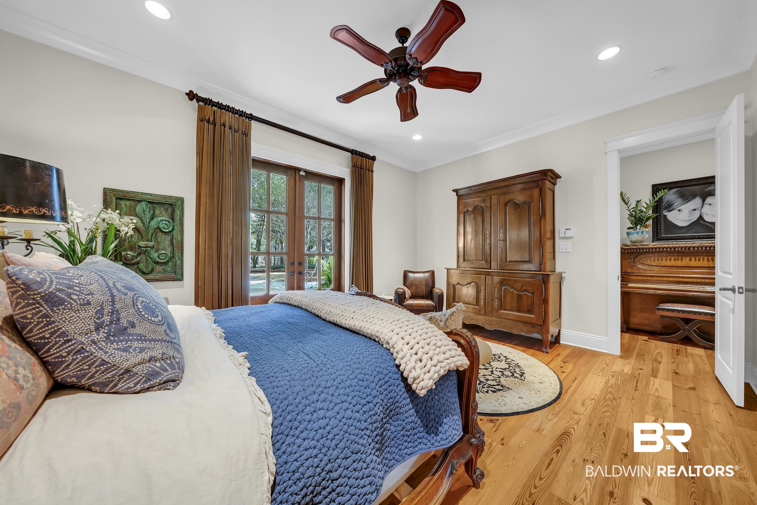 12161 Jessamine Street Magnolia Springs, AL 36555 - Photo 27 of 70 Bedroom featuring light wood-style flooring, access to outside, french doors, a ceiling fan, and recessed lighting