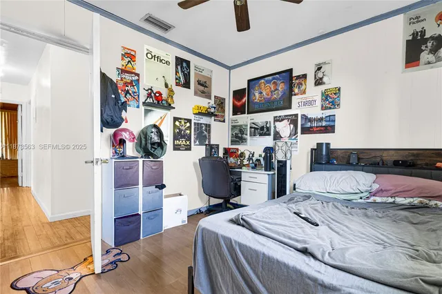 a bedroom with a bed and furniture