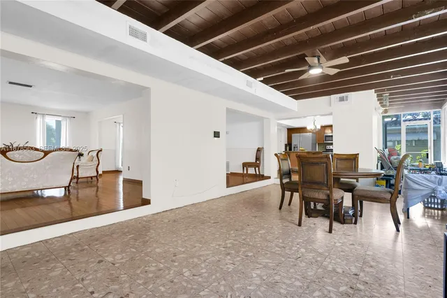 a dining room with furniture
