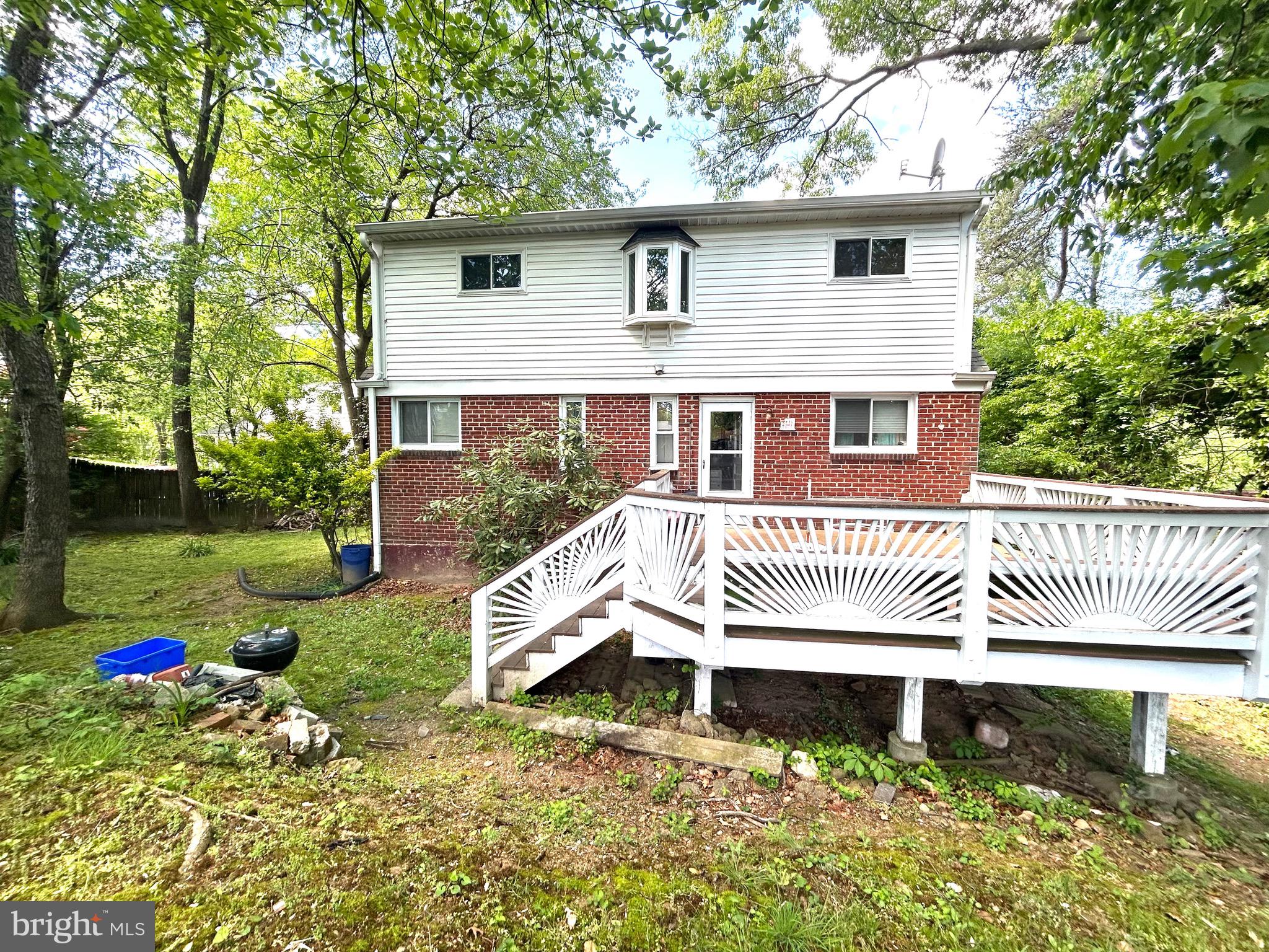 906 Dryden Court Silver Spring, MD 20901 - Photo 1 of 12 a front view of a house with a yard