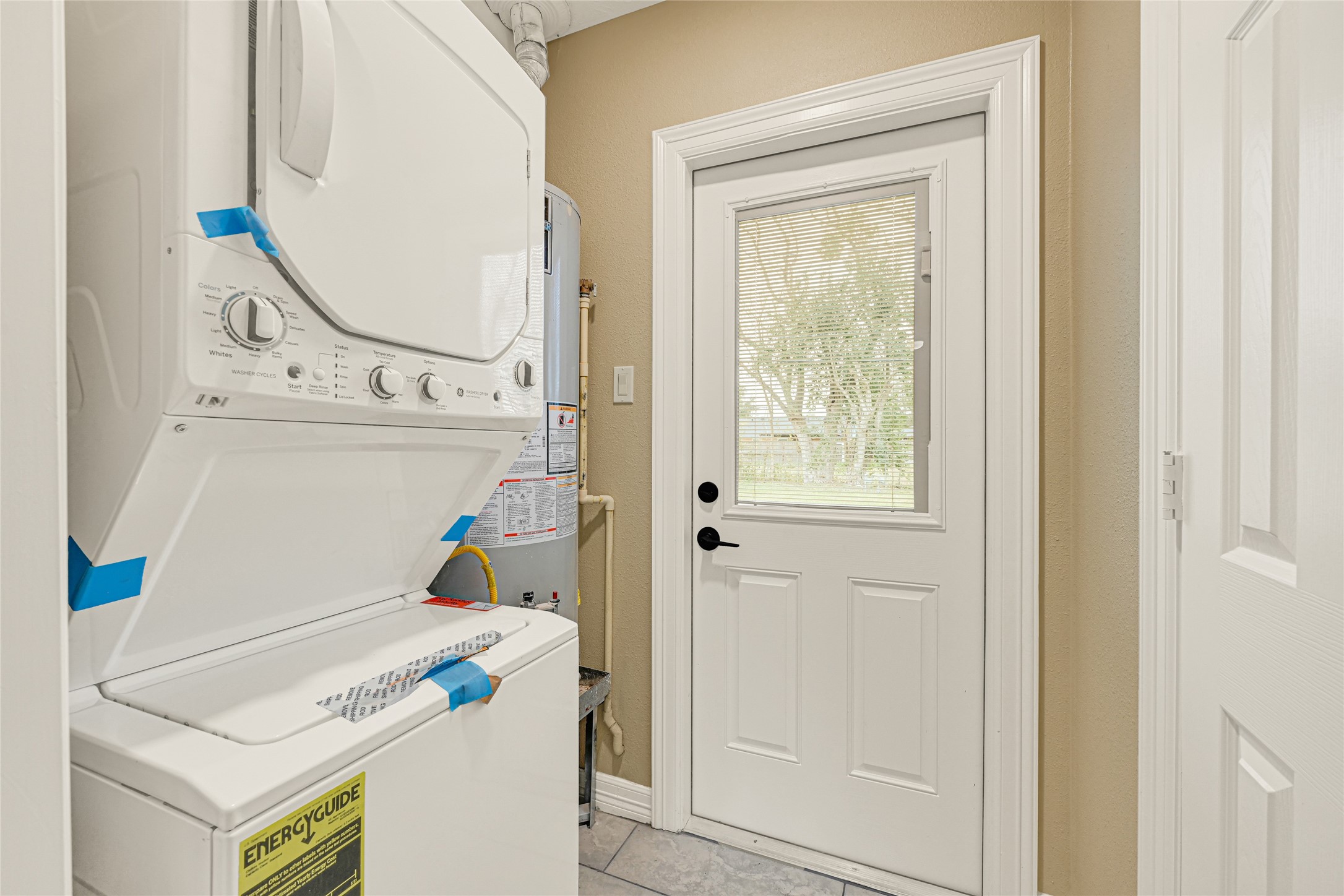 8526 Vennard Road Houston, TX 77034 - Photo 17 of 22 a utility room with dryer and washer