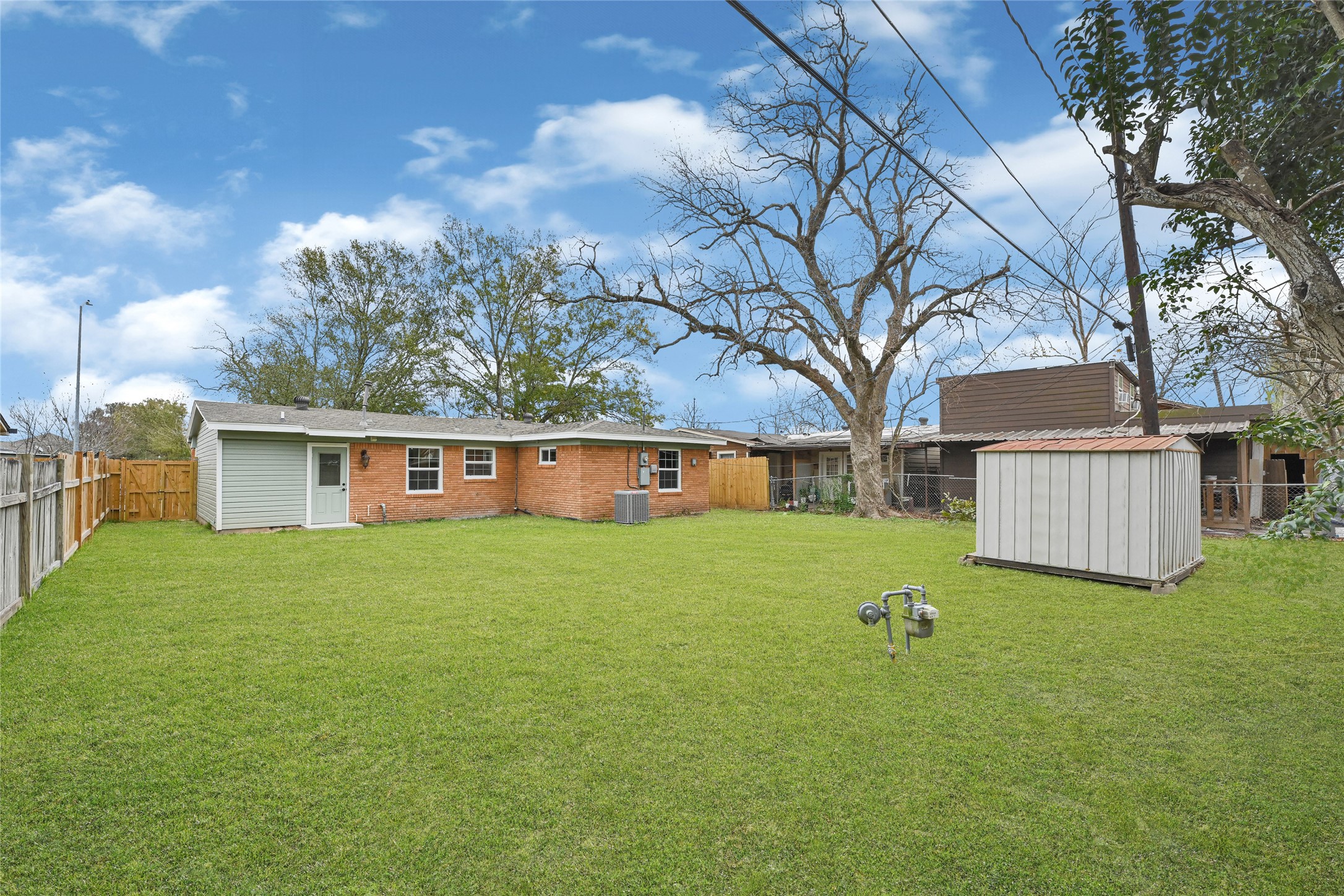 8526 Vennard Road Houston, TX 77034 - Photo 20 of 22 a front view of a house with garden