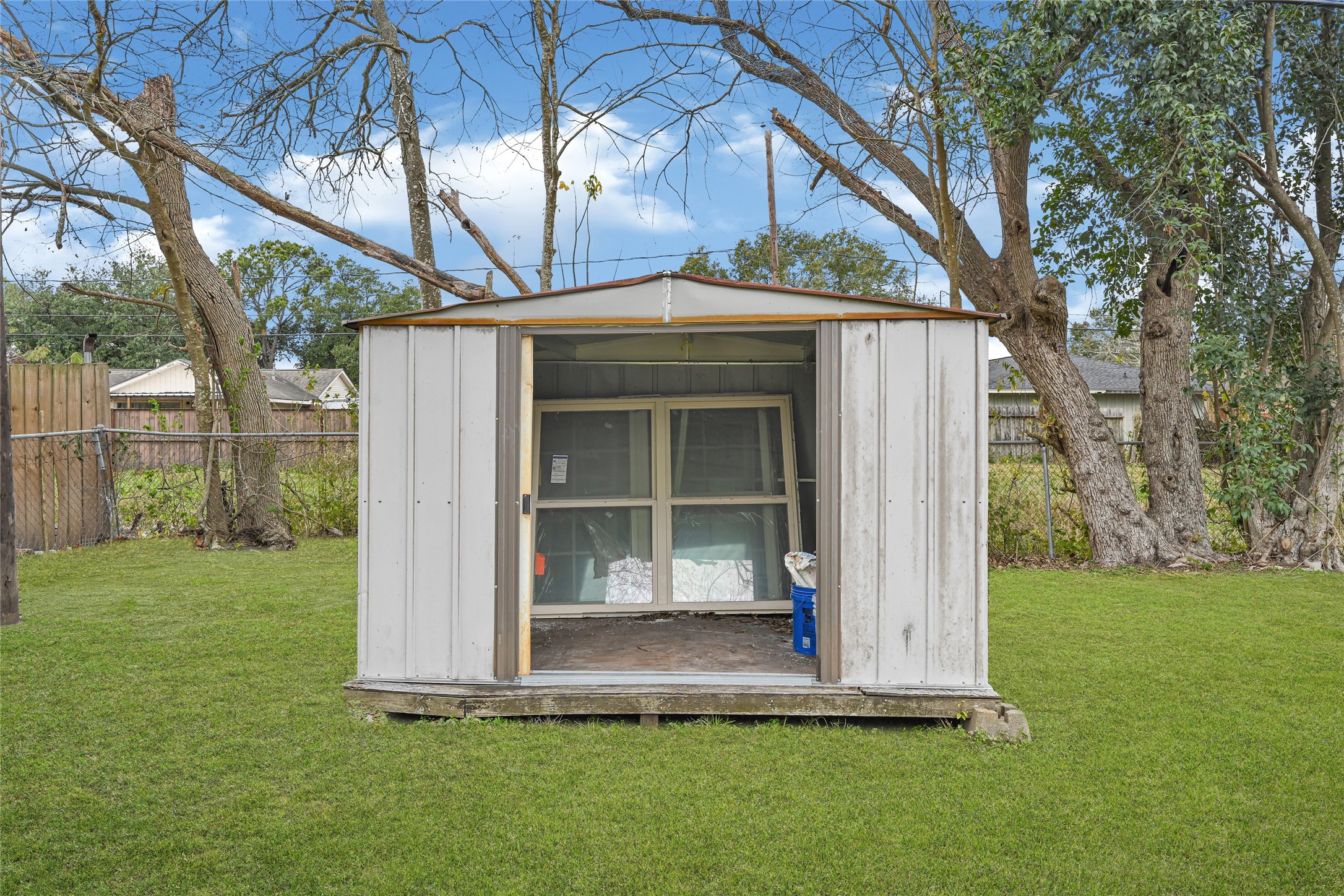 8526 Vennard Road Houston, TX 77034 - Photo 22 of 22 a front view of a house with a yard
