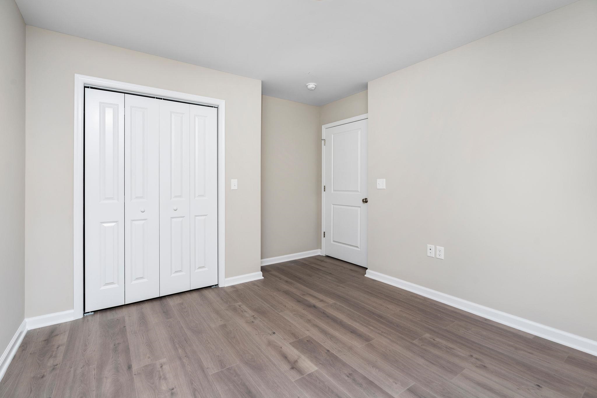 205 Spring Run Lane Waynesboro, VA 22980 - Photo 23 of 35 a view of an empty room with wooden floor