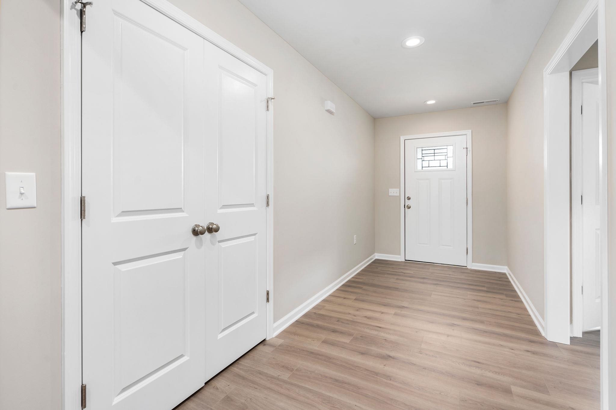 205 Spring Run Lane Waynesboro, VA 22980 - Photo 3 of 35 a view of a hallway with wooden floor