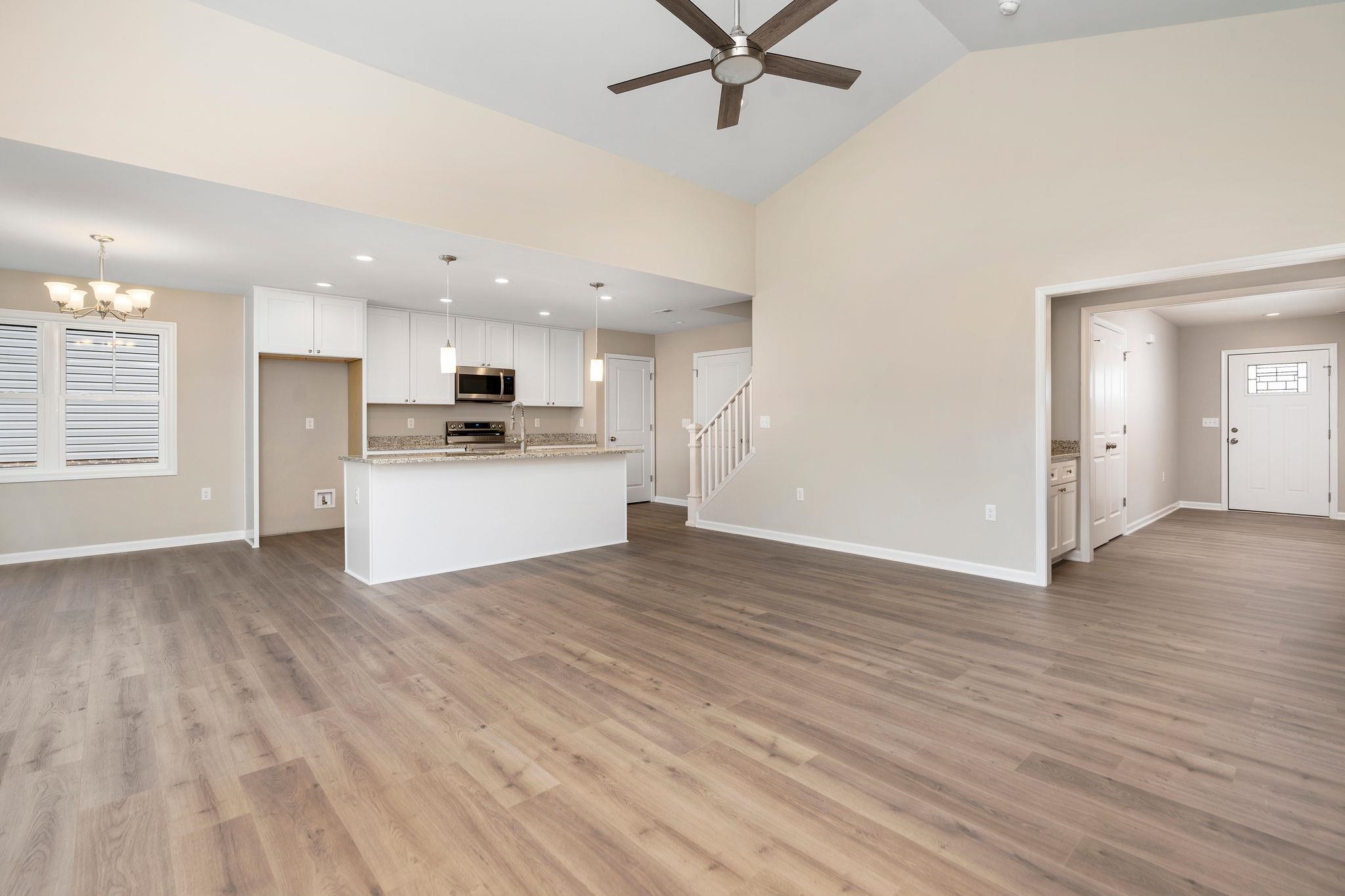 205 Spring Run Lane Waynesboro, VA 22980 - Photo 4 of 35 a view of a kitchen with a stove cabinets and wooden floor