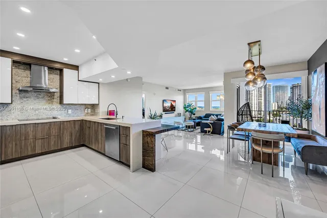 a kitchen with stainless steel appliances lots of counter top space