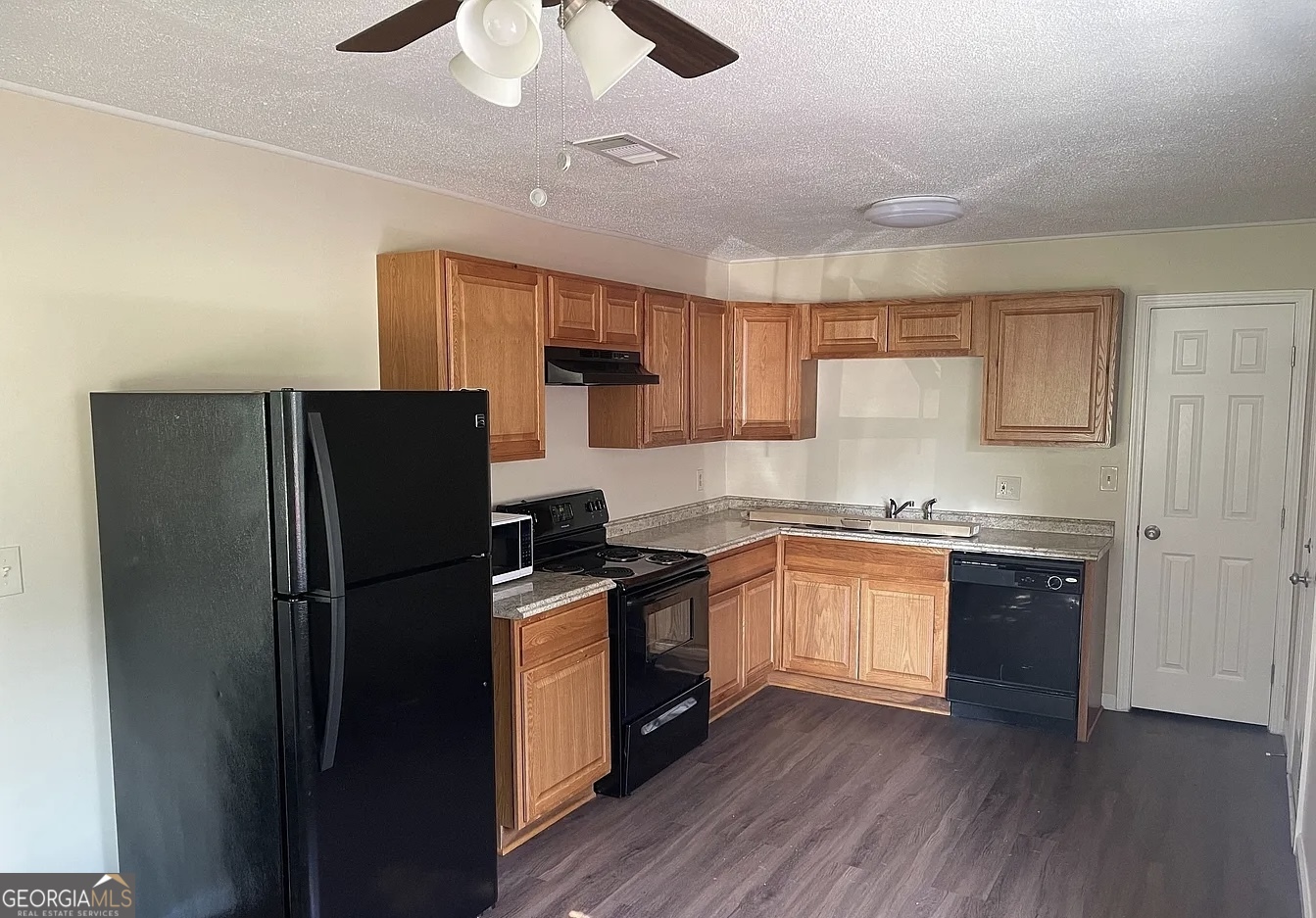 538 Southgate Avenue Albany, GA 31701 - Photo 5 of 16 a kitchen with stainless steel appliances granite countertop a refrigerator a sink dishwasher a stove and a refrigerator