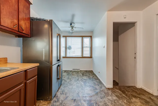a view of a storage & utility room with a sink