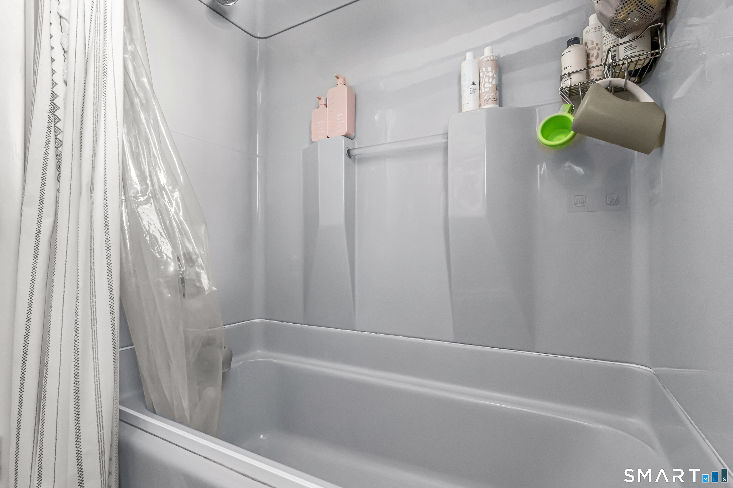 106 Hawley Avenue Milford, CT 06460 - Photo 15 of 39 a bathroom with a shower and a tub