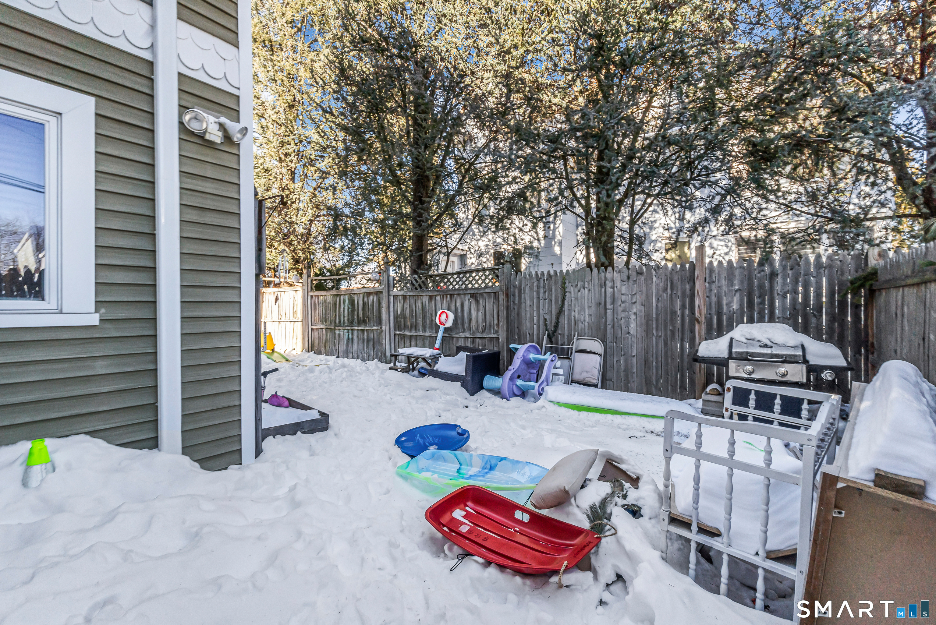 106 Hawley Avenue Milford, CT 06460 - Photo 18 of 39 a view of a patio with a chairs and table in a patio