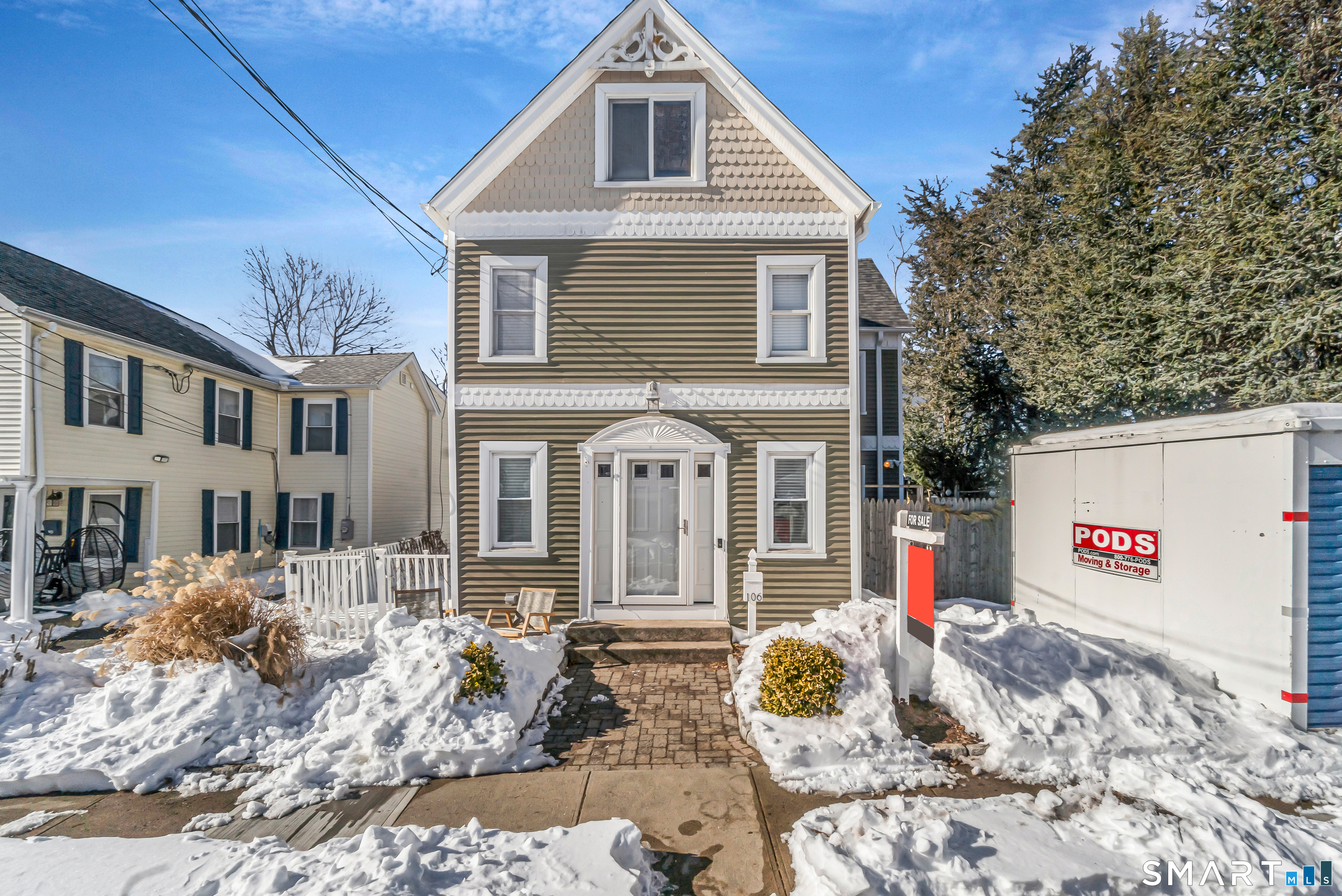 106 Hawley Avenue Milford, CT 06460 - Photo 25 of 39 a front view of a house with large trees