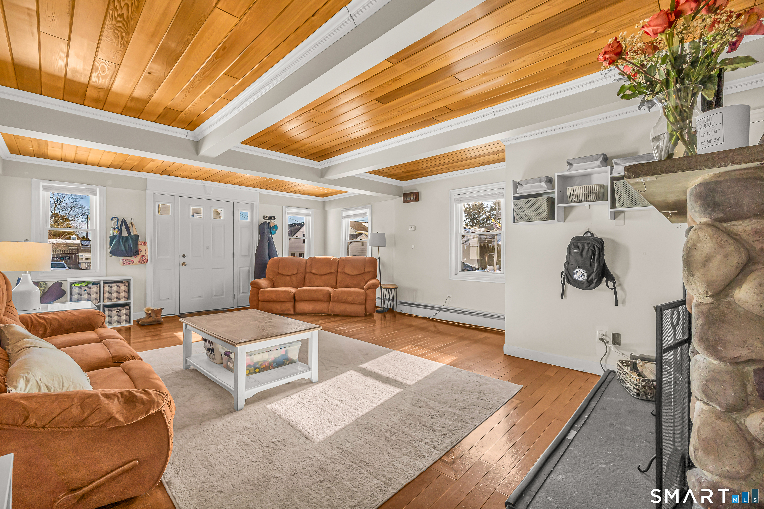 106 Hawley Avenue Milford, CT 06460 - Photo 28 of 39 a living room with furniture and wooden floor