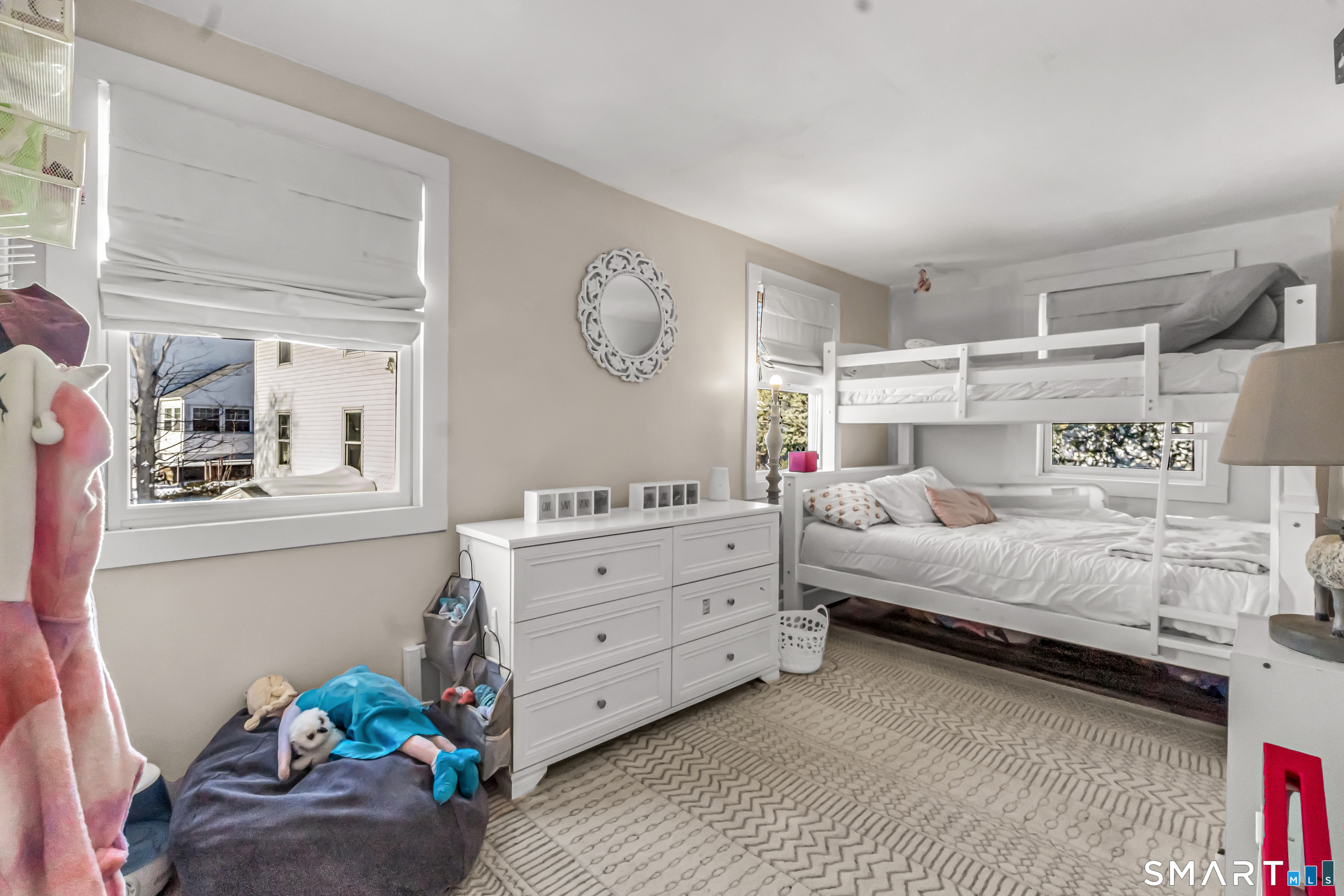 106 Hawley Avenue Milford, CT 06460 - Photo 7 of 39 a bedroom with a bed and a window