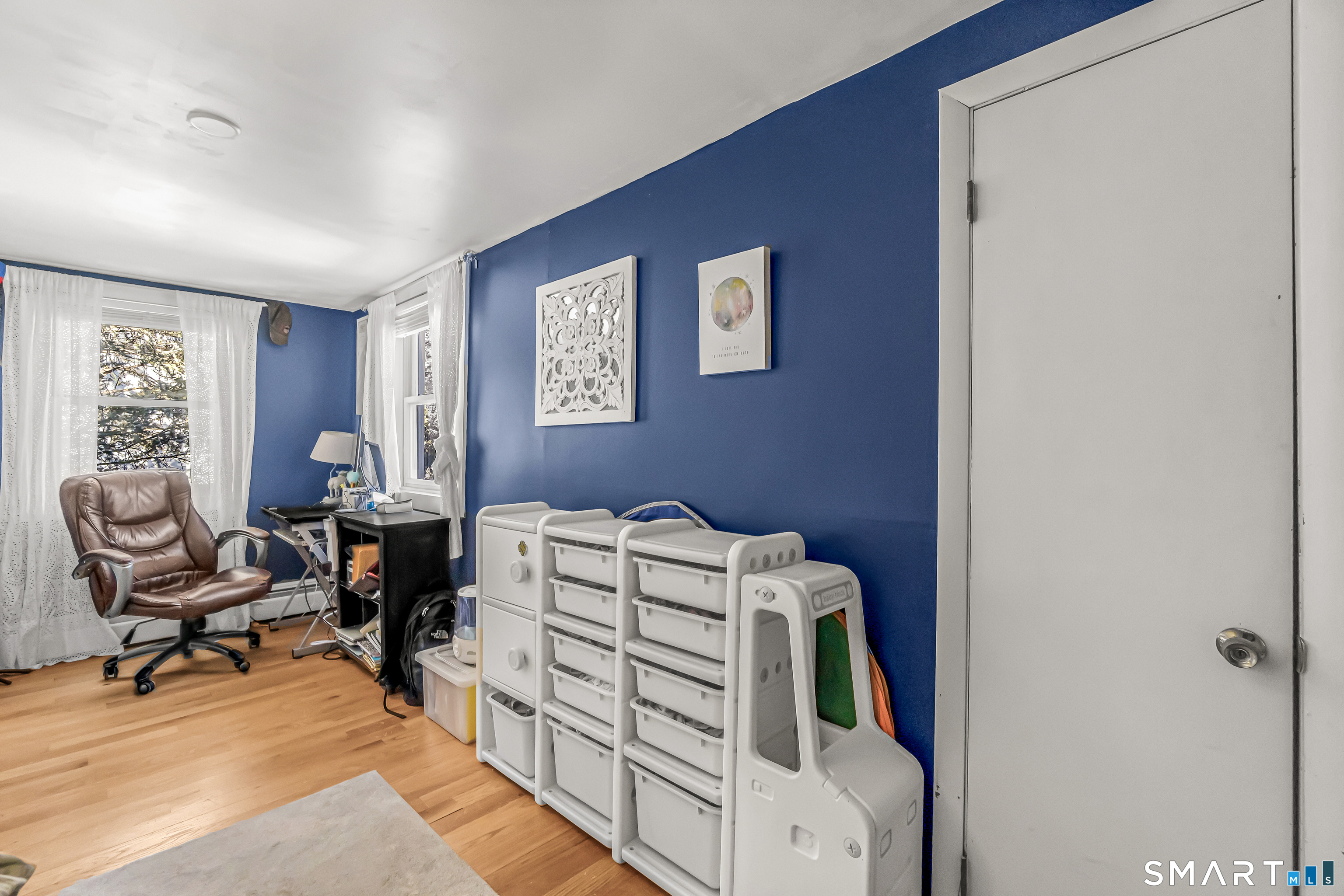 106 Hawley Avenue Milford, CT 06460 - Photo 10 of 39 a bedroom with a workspace