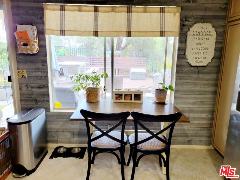 1744 Crystal Ridge Way Vista, CA 92081 - Photo 5 of 20 a dining room with furniture and window