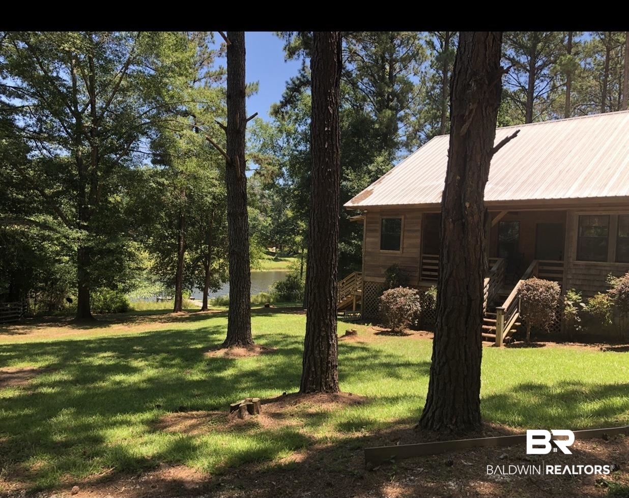 102 Brown Road Evergreen, AL 36401 - Photo 1 of 26 View front of the house and the lake