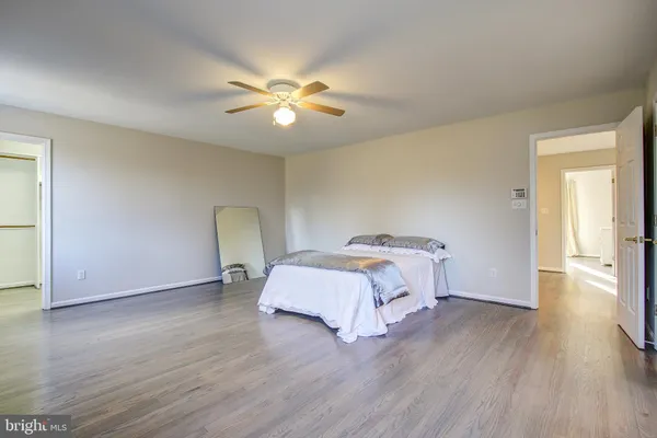 a bathroom with a granite countertop sink mirror and a