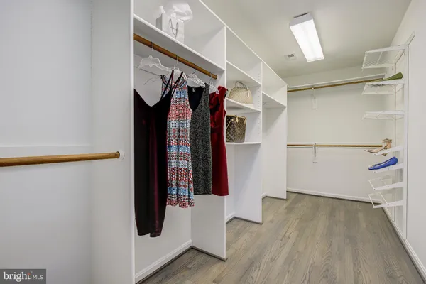 a view of a livingroom with furniture and a window