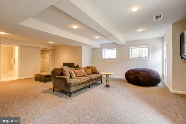 a bedroom with bed and window