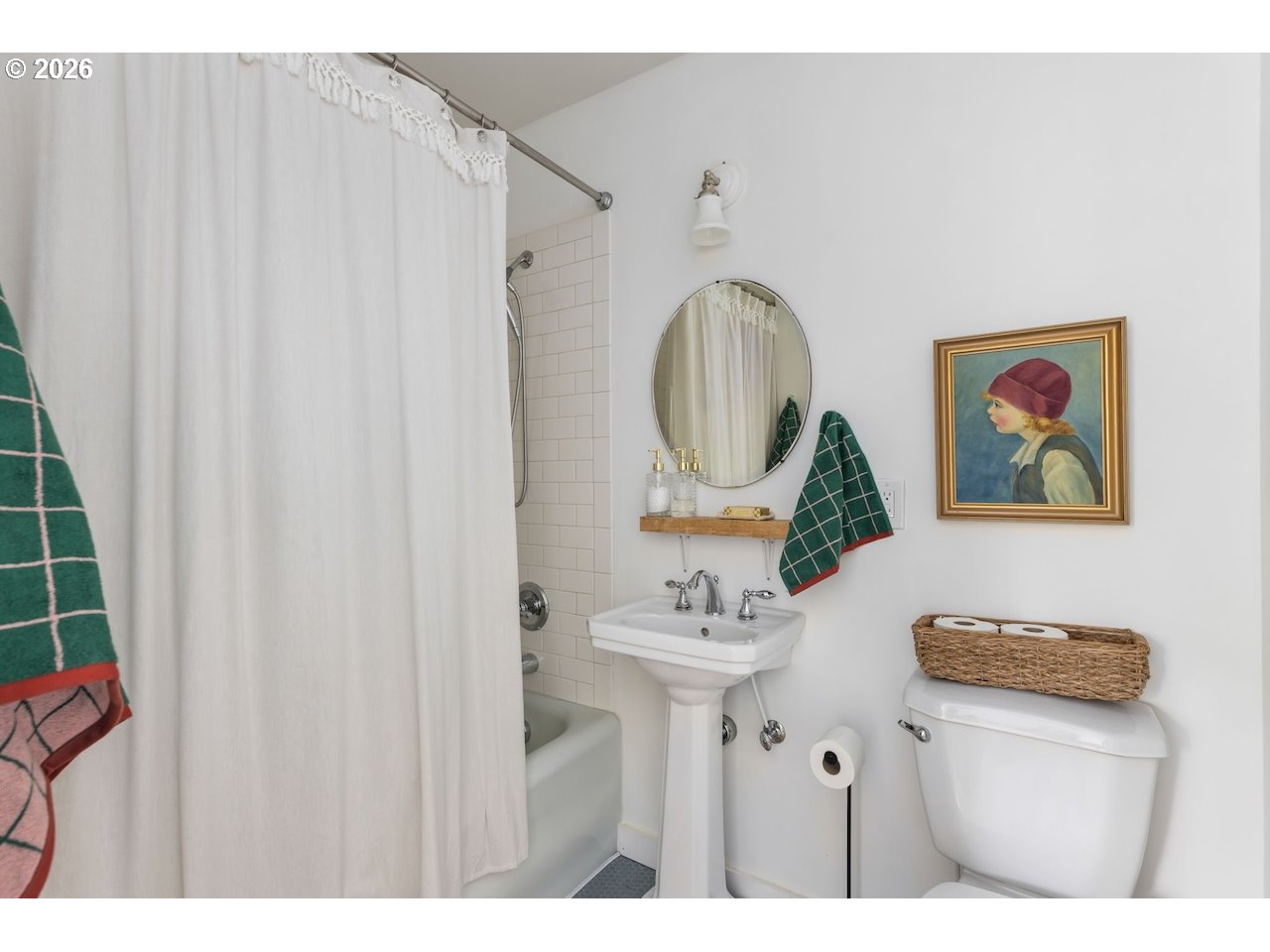 7416 Southeast 36th Avenue Portland, OR 97202 - Photo 19 of 45 a bathroom with a toilet a sink and a mirror