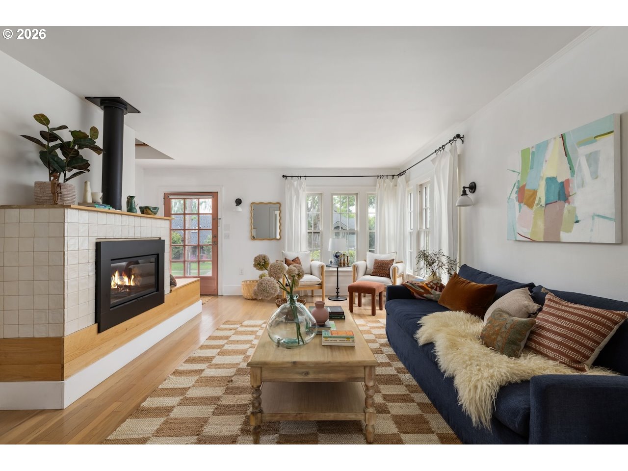7416 Southeast 36th Avenue Portland, OR 97202 - Photo 2 of 45 a living room with furniture and a fireplace