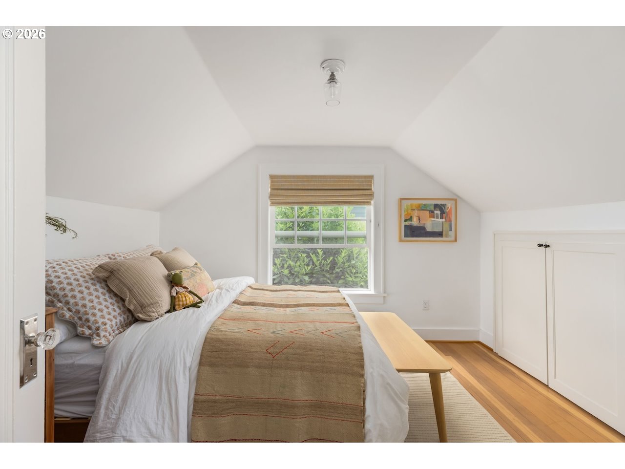 7416 Southeast 36th Avenue Portland, OR 97202 - Photo 23 of 45 a bedroom with a bed and a window