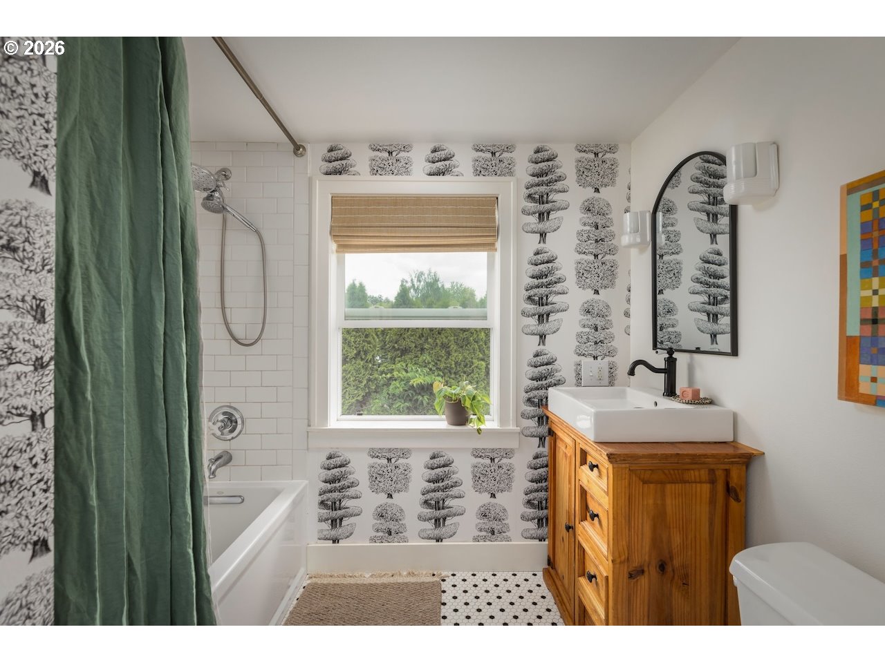 7416 Southeast 36th Avenue Portland, OR 97202 - Photo 25 of 45 a bathroom with a sink a mirror a window and a shower