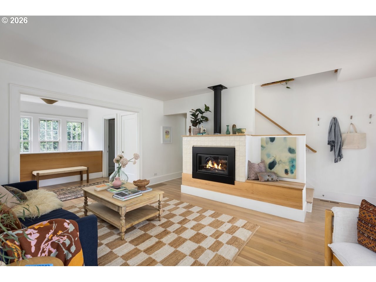 7416 Southeast 36th Avenue Portland, OR 97202 - Photo 3 of 45 a living room with furniture and a fireplace
