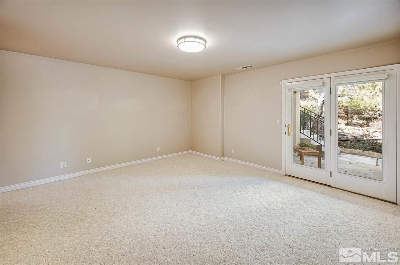 1585 Star Way Reno, NV 89511 - Photo 17 of 25 a view of an empty room with a window