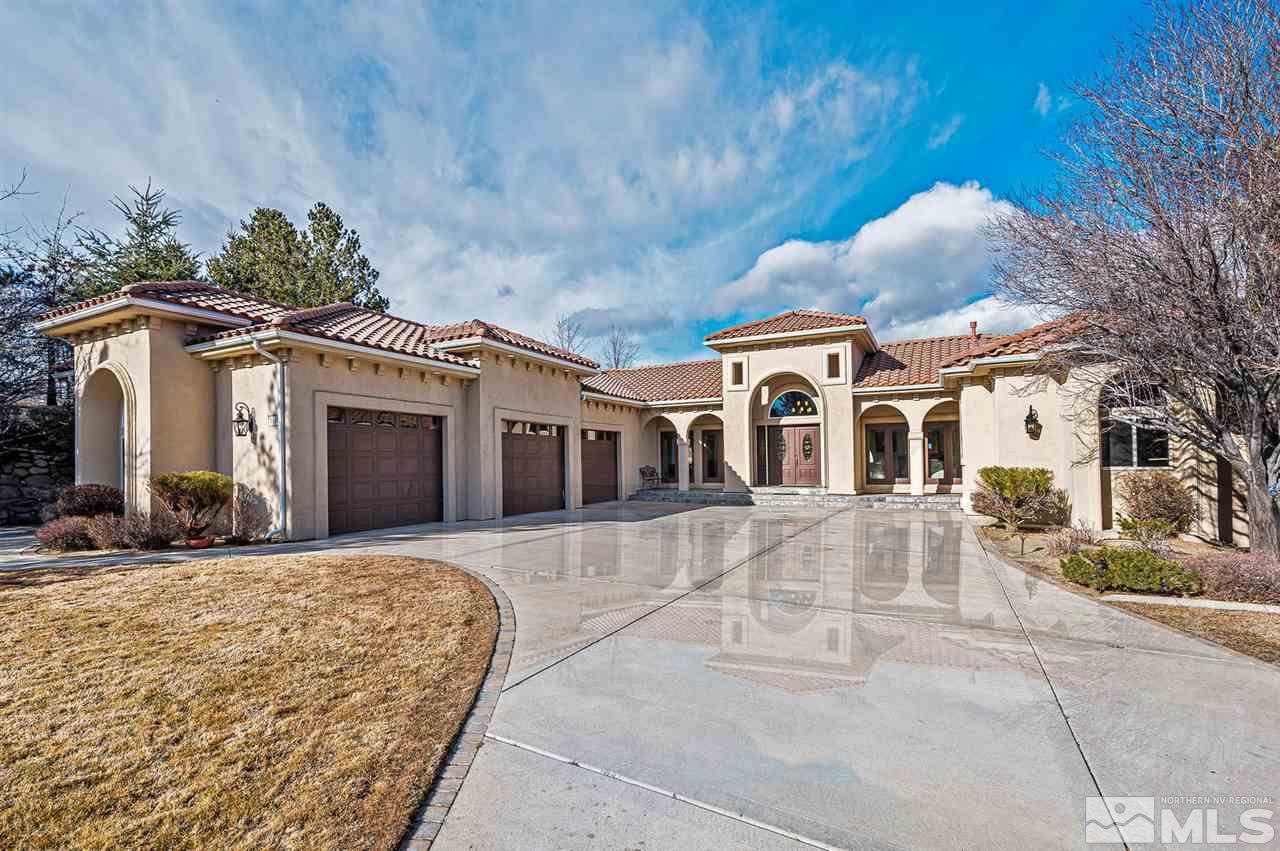1585 Star Way Reno, NV 89511 - Photo 3 of 25 a front view of a house with a yard