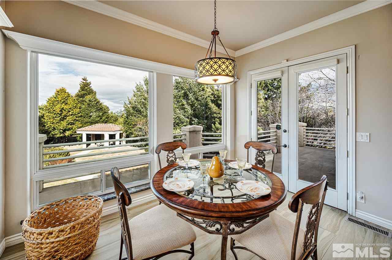 1585 Star Way Reno, NV 89511 - Photo 6 of 25 a view of a dining room with furniture window and outside view