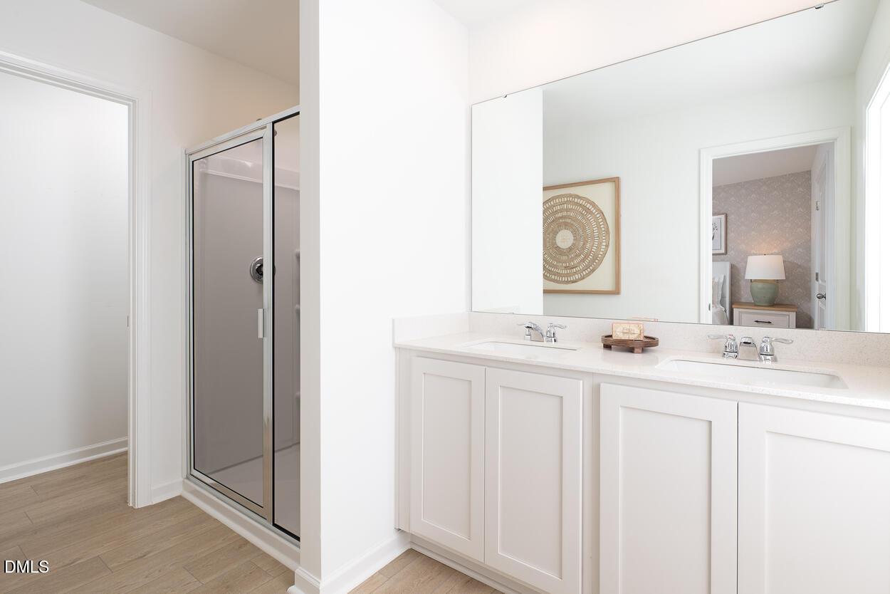 1513 Mirth Court Rolesville, NC 27571 - Photo 15 of 30 a view of bathroom with dual sinks