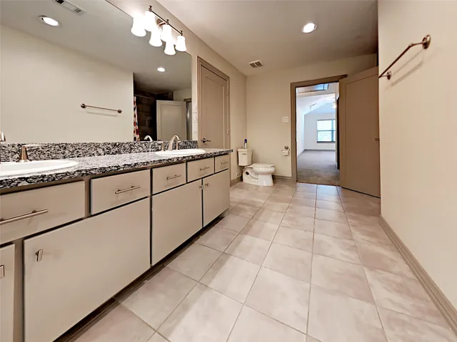 a bathroom with a sink a mirror and a bathtub