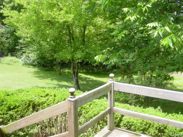 4141 Laurel Hills Road Raleigh, NC 27612 - Photo 9 of 10 a view of a wooden fence