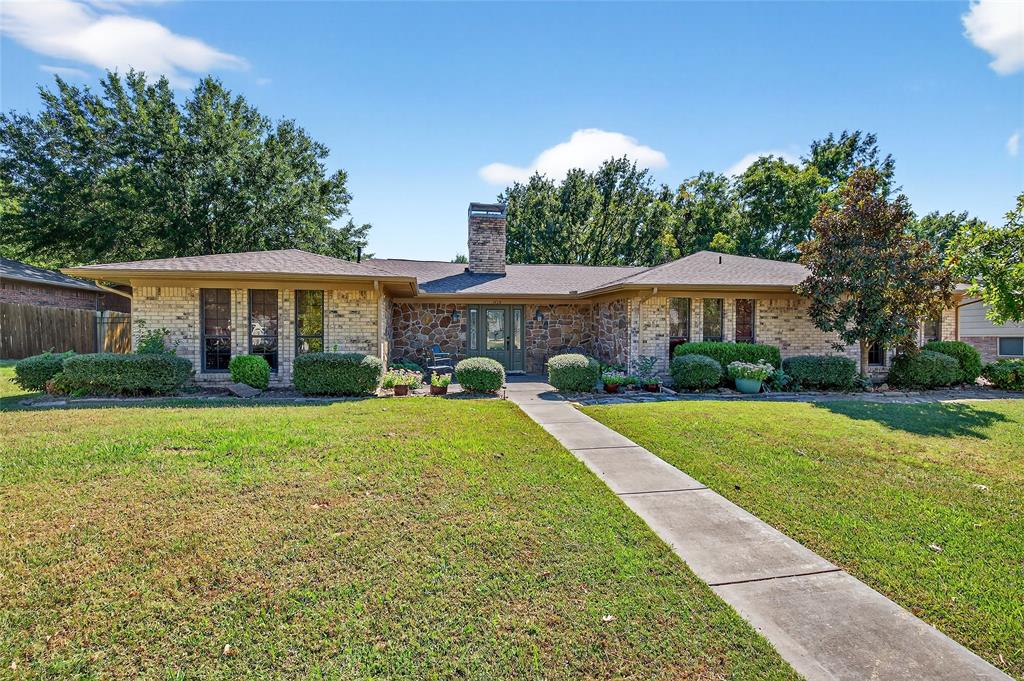 1610 Idlewood Drive Sherman, TX 75092 - Photo 2 of 31 a view of a house with a yard