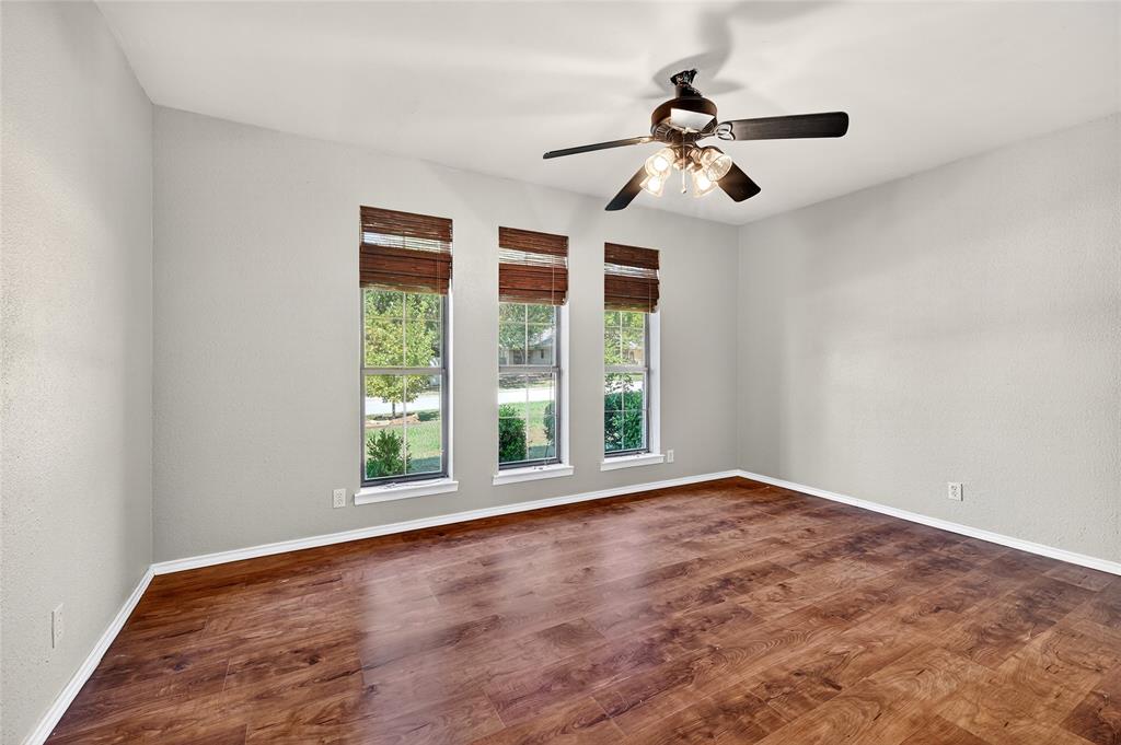 1610 Idlewood Drive Sherman, TX 75092 - Photo 24 of 31 a view of room with window and ceiling fan