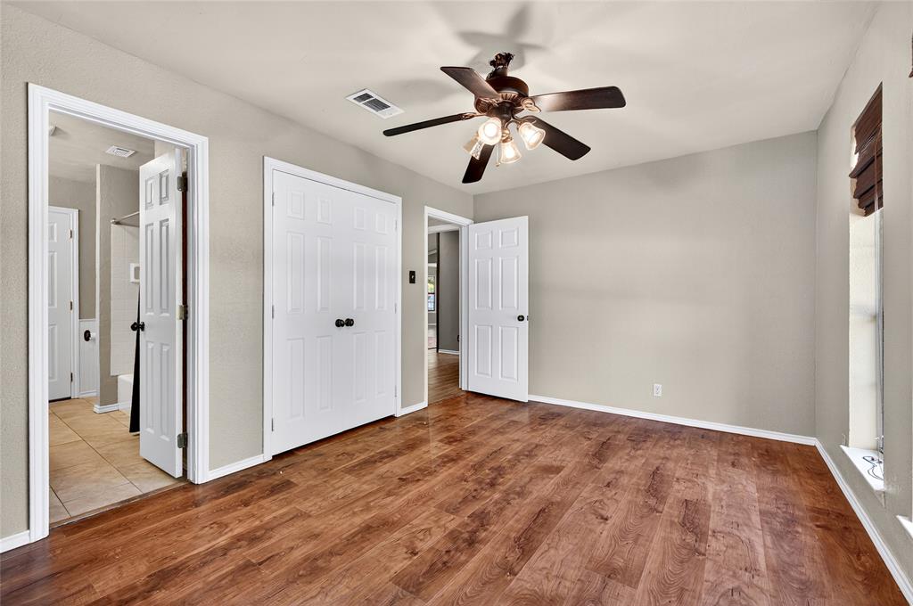 1610 Idlewood Drive Sherman, TX 75092 - Photo 25 of 31 a view of an empty room and wooden floor