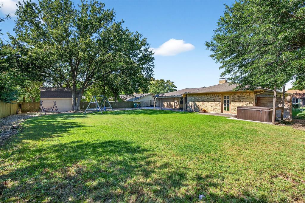 1610 Idlewood Drive Sherman, TX 75092 - Photo 29 of 31 a view of a house with a yard