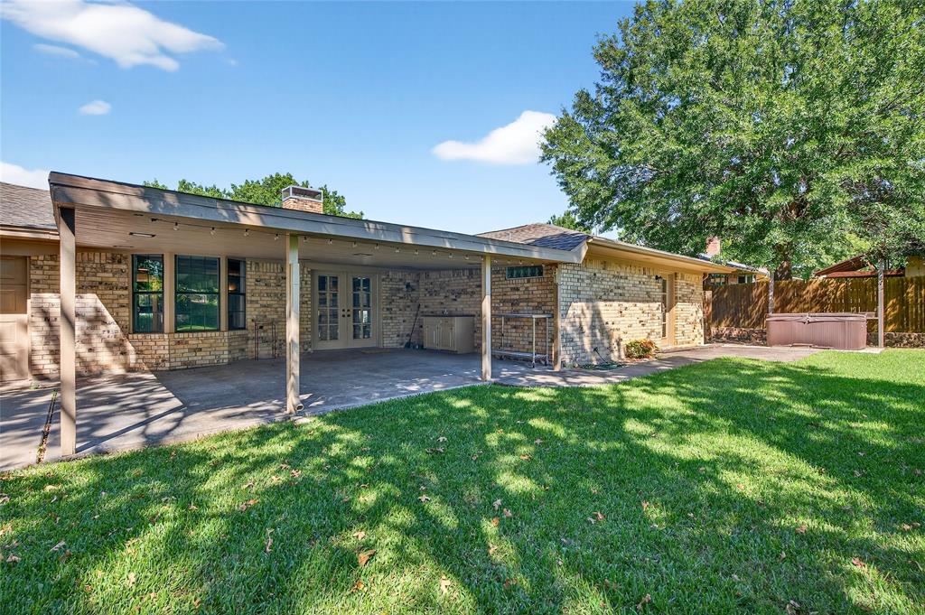 1610 Idlewood Drive Sherman, TX 75092 - Photo 30 of 31 a view of a house with a yard and sitting area
